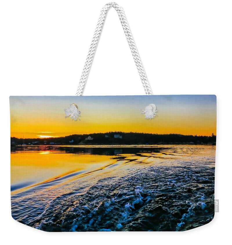Waterscape Weekender Tote Bag featuring the photograph Sunset on the water by Tatiana Travelways
