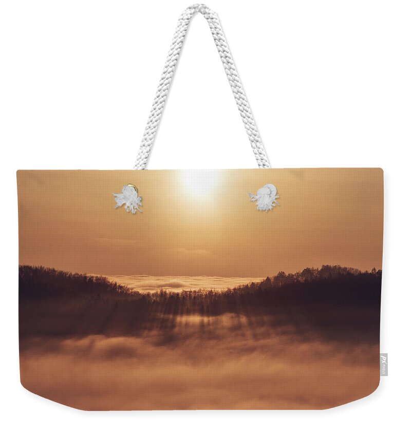 Palkovicke Hurky Weekender Tote Bag featuring the photograph Sunset over a sea of clouds by Vaclav Sonnek