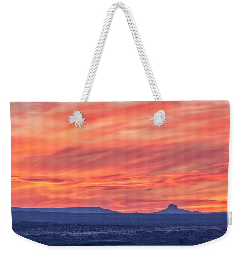 Caldera Weekender Tote Bag featuring the photograph Sunset Over Cabezon Peak by Jurgen Lorenzen