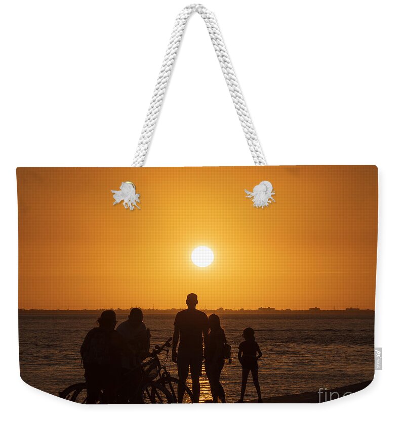 Sunset Weekender Tote Bag featuring the photograph Sunset over Tampa Bay in Silhouette by L Bosco