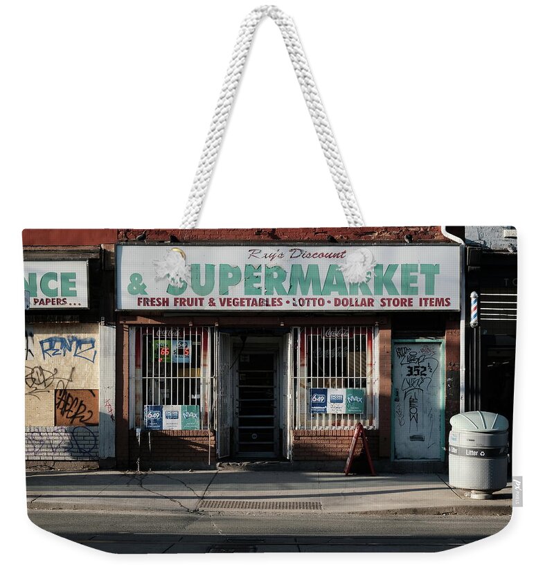 Storefront Weekender Tote Bag featuring the photograph Super by Kreddible Trout