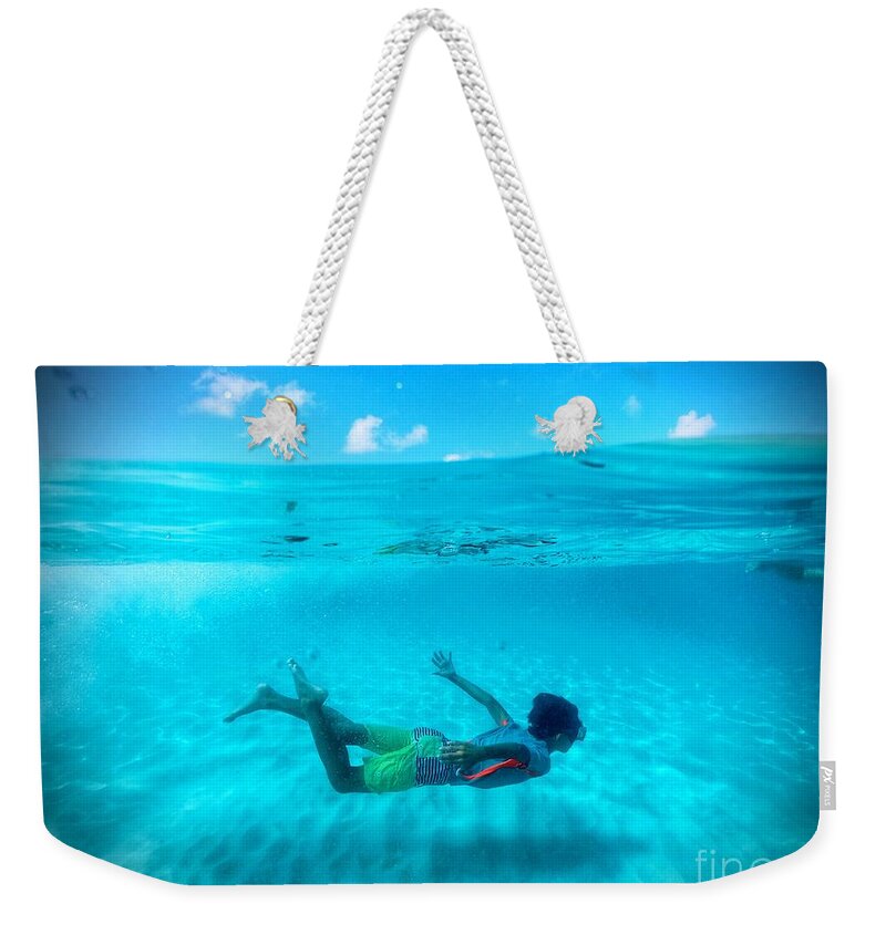 Grand Anse Beach Weekender Tote Bag featuring the photograph Swimming Free by Laura Forde