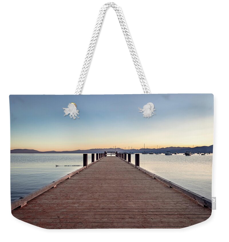 Lake Tahoe Weekender Tote Bag featuring the photograph Lake Tahoe Sunrise at Dock by Gary Geddes