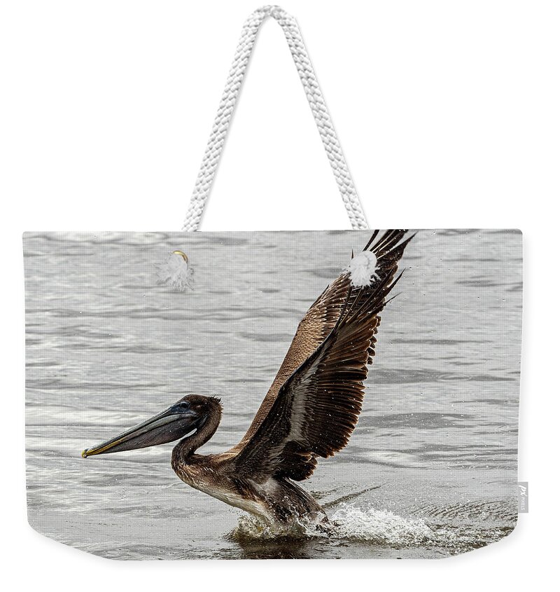 Brown Pelican Weekender Tote Bag featuring the photograph Take Off 2 by Jerry Connally