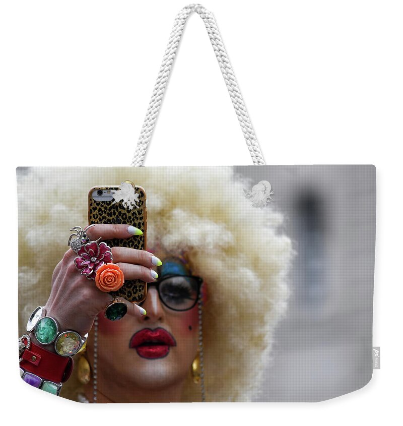 Lgbt Weekender Tote Bag featuring the photograph Taking a selfie during Pride in London 2019 by Andrew Lalchan