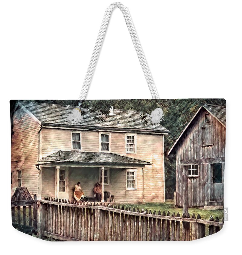  Weekender Tote Bag featuring the photograph Taking a Well-Deserved Rest by Jack Wilson