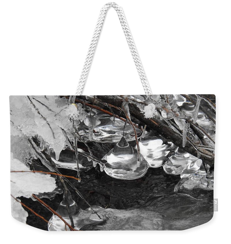  Weekender Tote Bag featuring the photograph Teardrop ice by Nicola Finch
