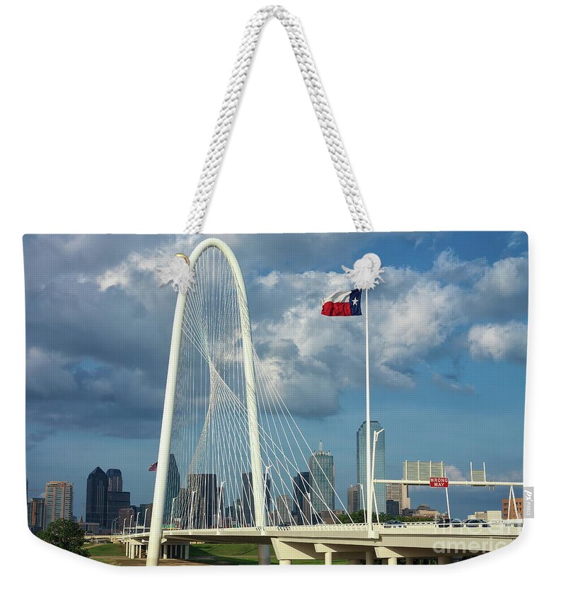 Cityscape Weekender Tote Bag featuring the photograph Texas Flag on a Windy Day by Diana Mary Sharpton