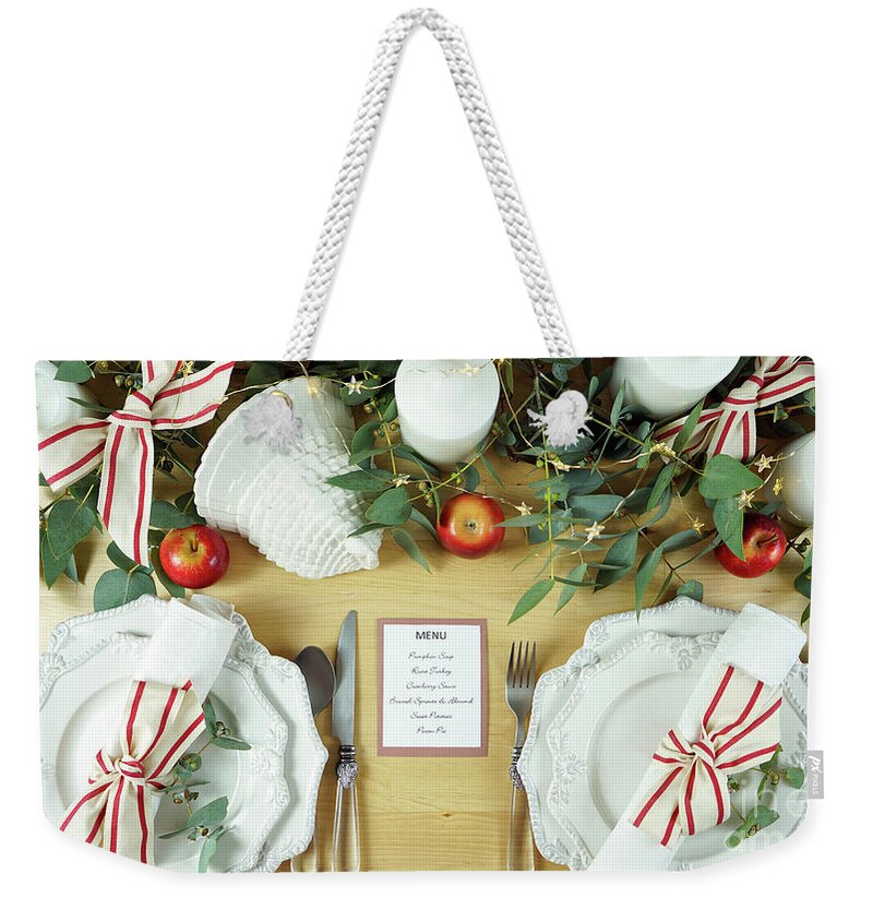 Thanksgiving Weekender Tote Bag featuring the photograph Thanksgiving setting modern elegant red and white table overhead flat lay. by Milleflore Images