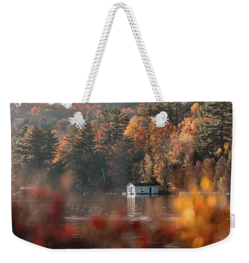 Lake Placid Weekender Tote Bag featuring the photograph The Boathouse by Dave Niedbala