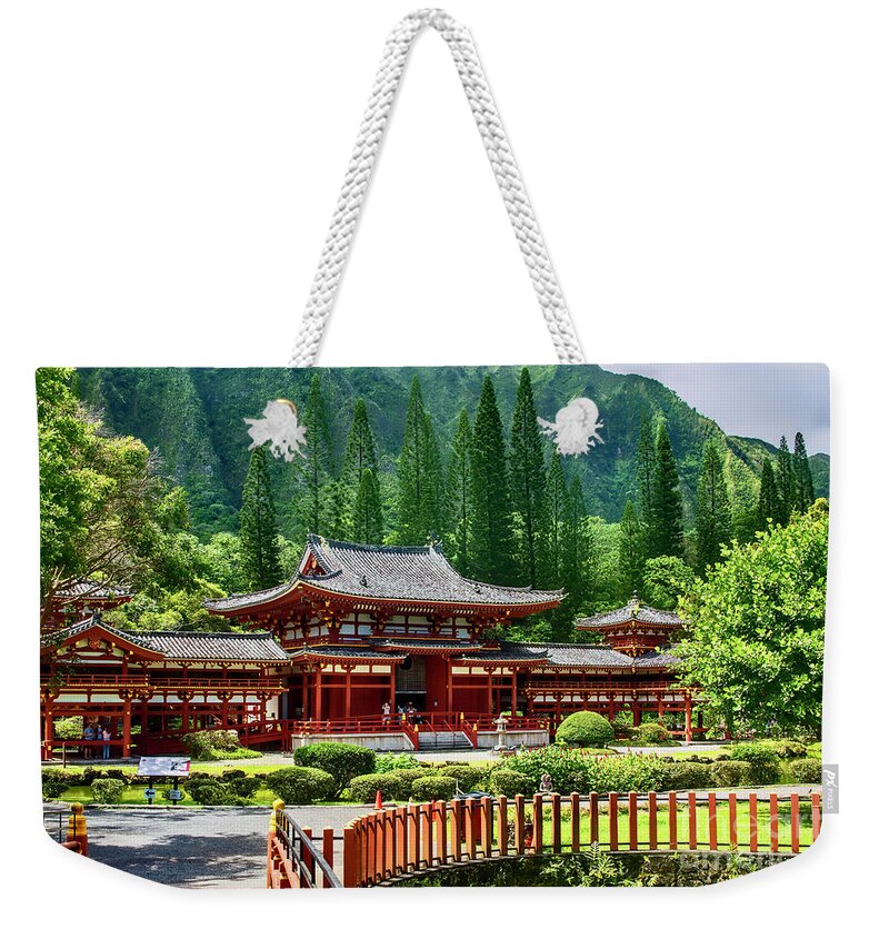 Buddhist Weekender Tote Bag featuring the photograph The Byodo-In Temple by Diana Mary Sharpton