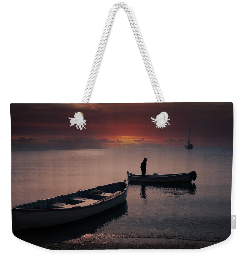 Sailing Weekender Tote Bag featuring the photograph The Captain by Fred LeBlanc