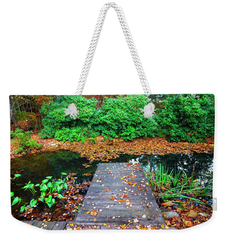 Blairsville Weekender Tote Bag featuring the photograph The Dock at the Koi Pond by Debra and Dave Vanderlaan