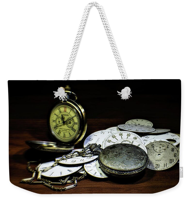 Analog Weekender Tote Bag featuring the photograph The Faces of Time by Tom Mc Nemar
