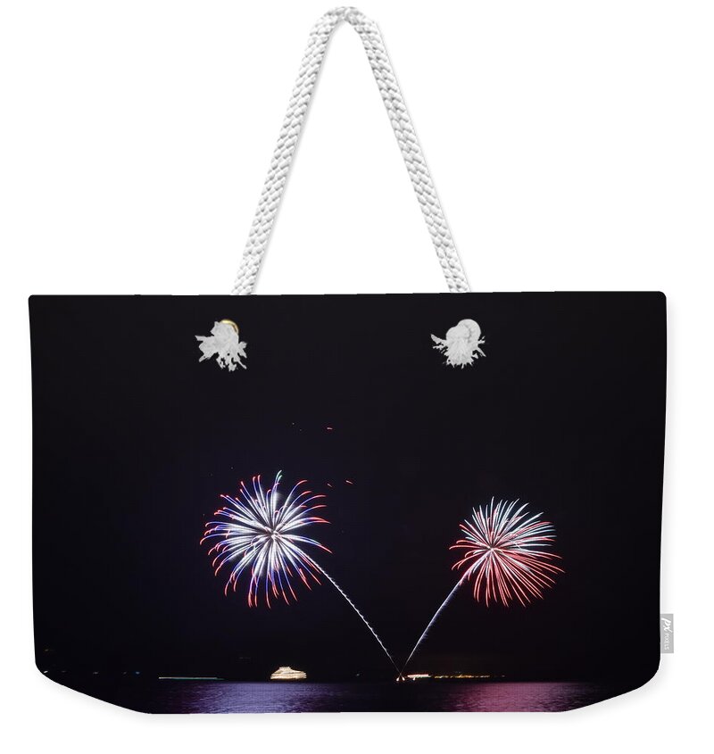 Fireworks Weekender Tote Bag featuring the photograph The fireworks on the lake in Hokkaido, Japan	 by Yujun