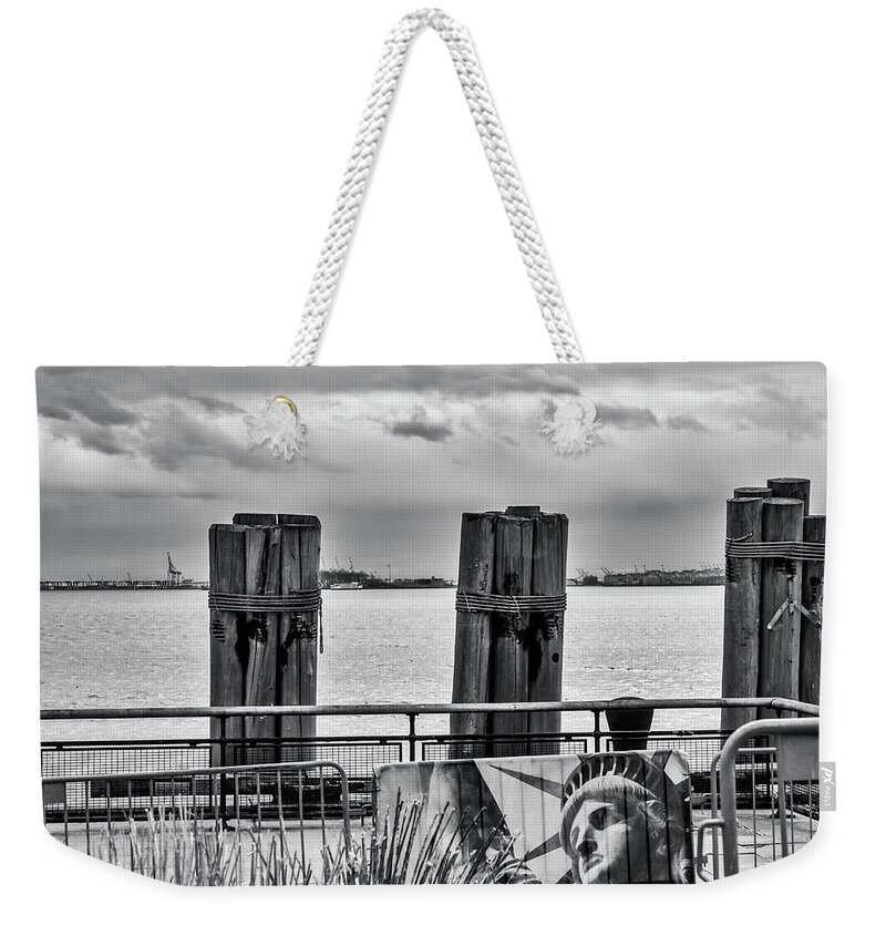 Battery Park Weekender Tote Bag featuring the photograph The Gates to Liberty by Cate Franklyn