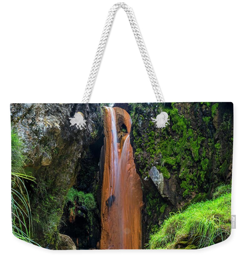 Andes Weekender Tote Bag featuring the photograph The golden waterfall by Henri Leduc