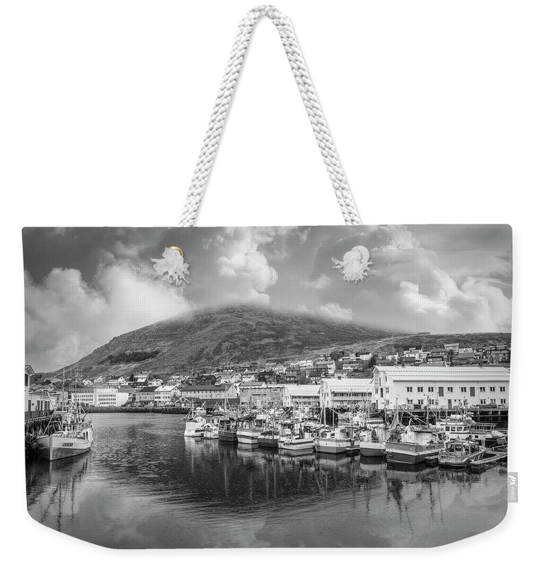 Boats Weekender Tote Bag featuring the photograph The Harbor at Honningvag Norway Under Clouds in Black and White by Debra and Dave Vanderlaan
