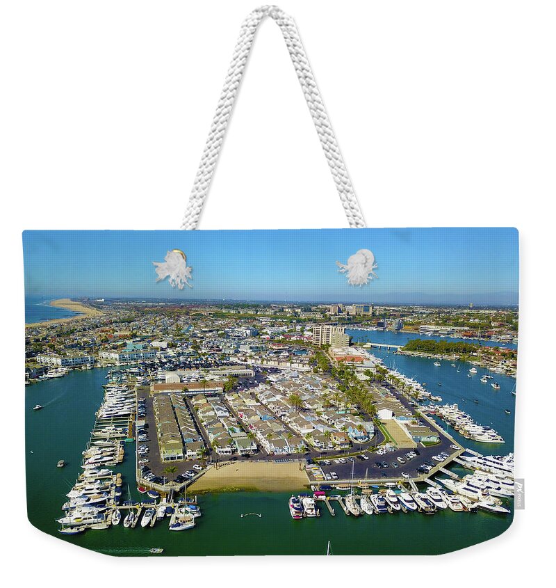 Boats Weekender Tote Bag featuring the photograph The Harbor in the Sunshine by Marcus Jones