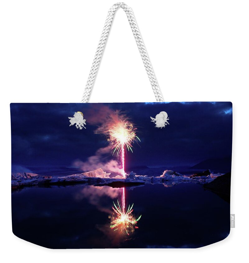 Fireworks Weekender Tote Bag featuring the photograph The ice candle by Christopher Mathews