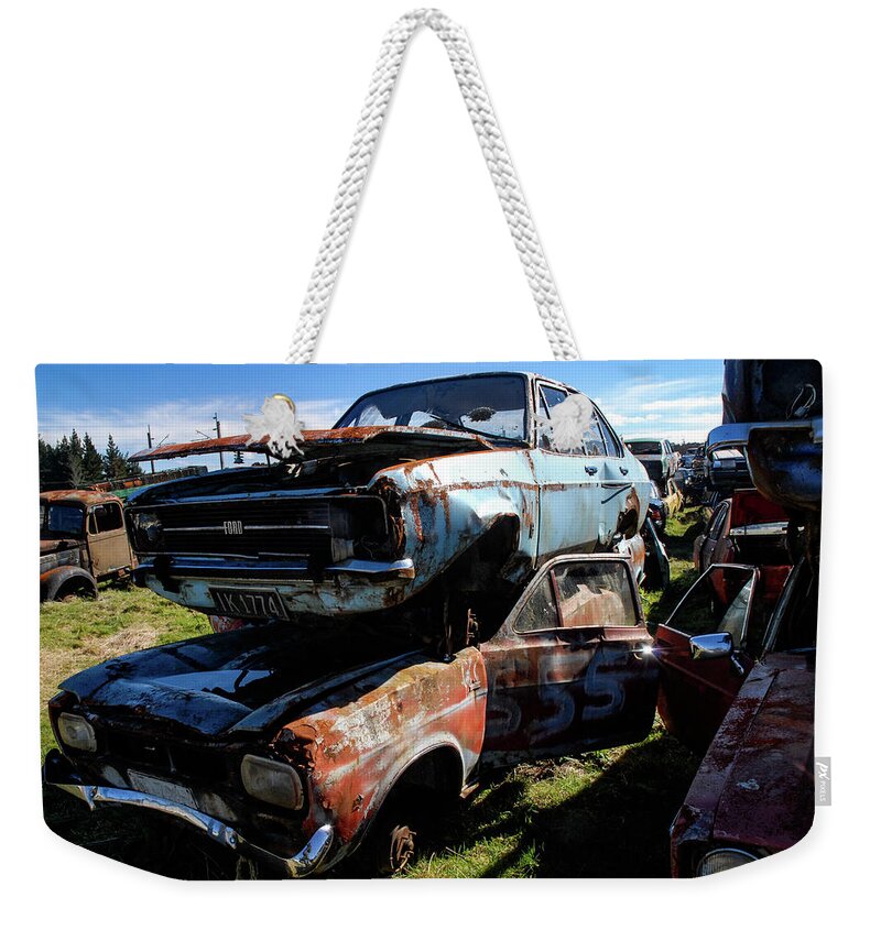 Wrecking Yard Weekender Tote Bag featuring the photograph The Junkyard Diaries II - Smash Palace. North Island, New Zealand by Earth And Spirit