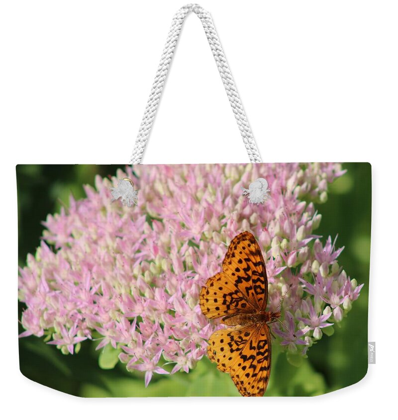 Flower Weekender Tote Bag featuring the photograph The Last Flower of Summer by Christopher Reed