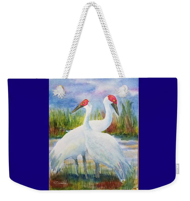 Sandhill Cranes Weekender Tote Bag featuring the painting The Locals by Ann Frederick