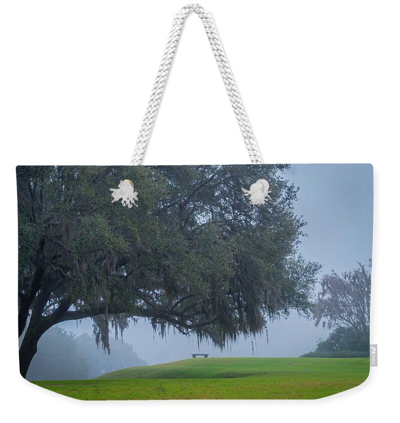 Chapel Weekender Tote Bag featuring the photograph The Lone Bench by Cindy Robinson
