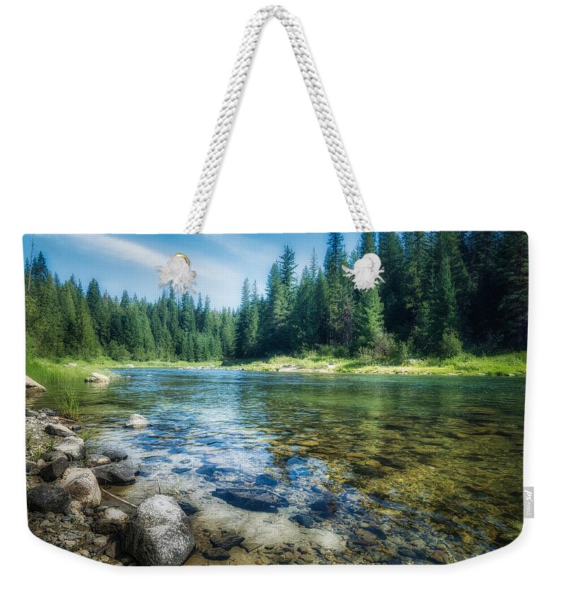Priest River Weekender Tote Bag featuring the photograph The Priest River by Dan Eskelson