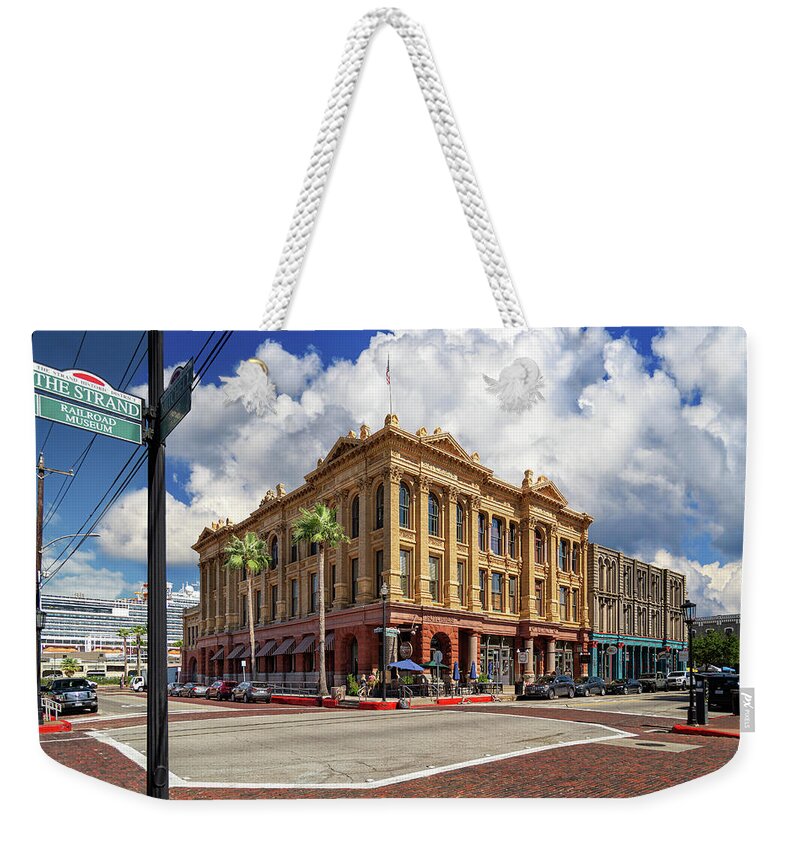 Galveston Weekender Tote Bag featuring the photograph The Strand In Galveston by James Eddy
