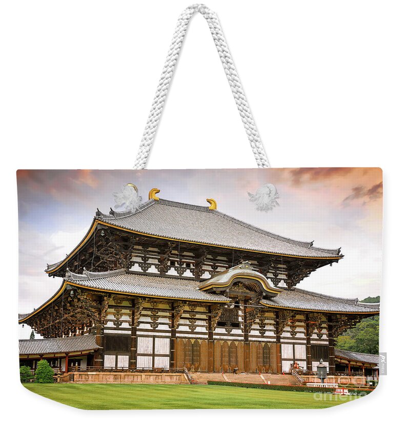 Temple Weekender Tote Bag featuring the photograph The Todai-Ji Temple in Nara, Japan, at sunset. by Jane Rix
