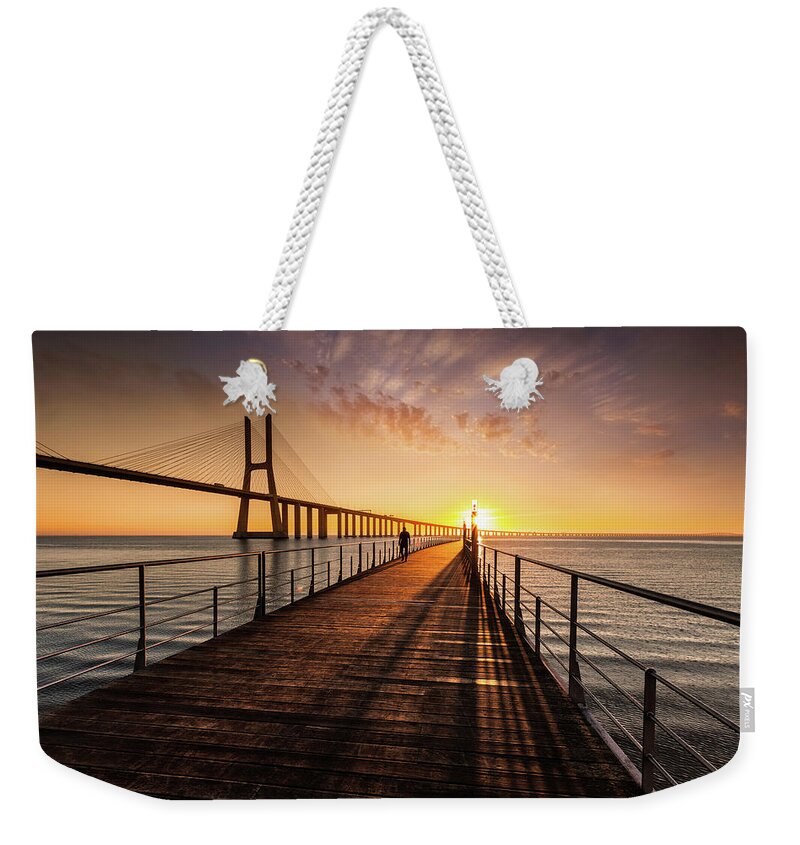 Lisbon Weekender Tote Bag featuring the photograph The walker by Jorge Maia