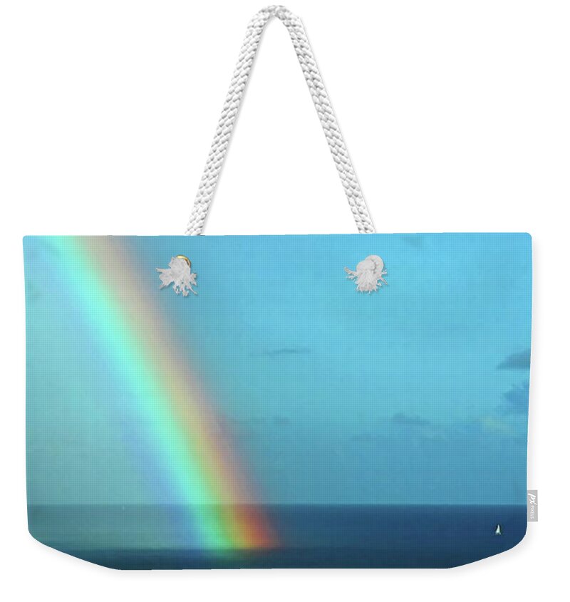 Boat Weekender Tote Bag featuring the photograph TheEdge of the Rainbow by Rod Melotte
