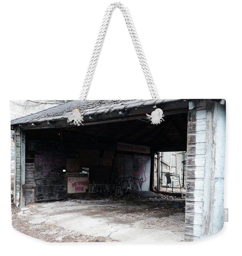 Urban Weekender Tote Bag featuring the photograph They Smoked Here by Kreddible Trout