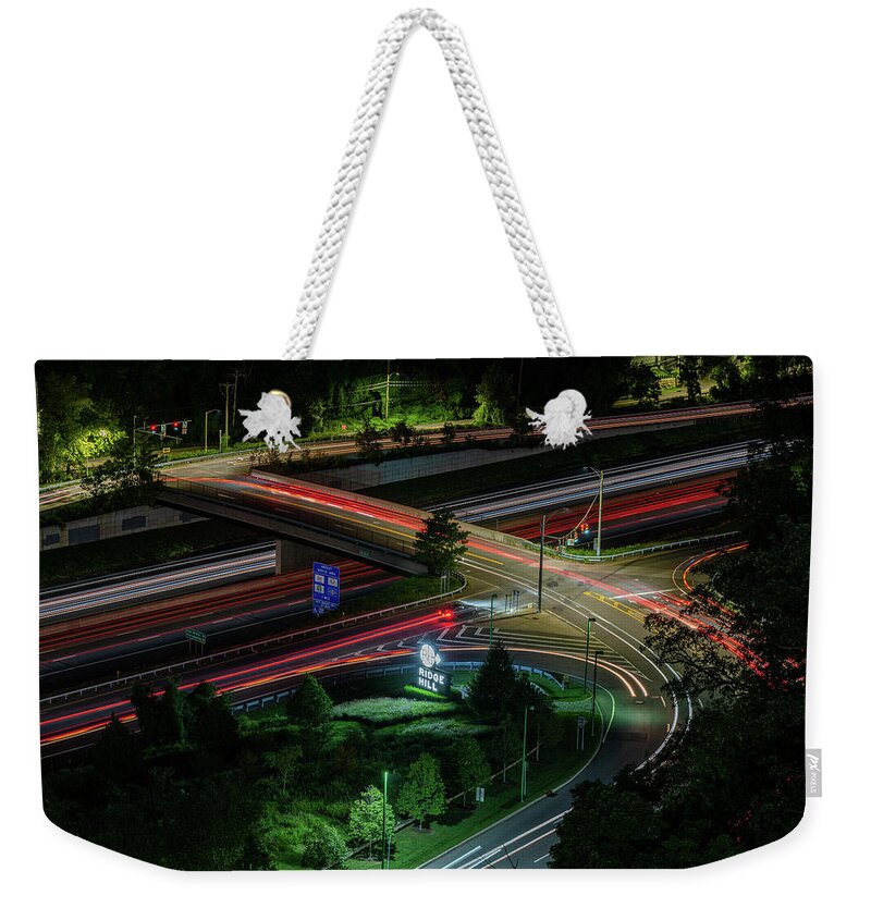 Ridge Hill Boulevard Weekender Tote Bag featuring the photograph Thruway at Night by Kevin Suttlehan