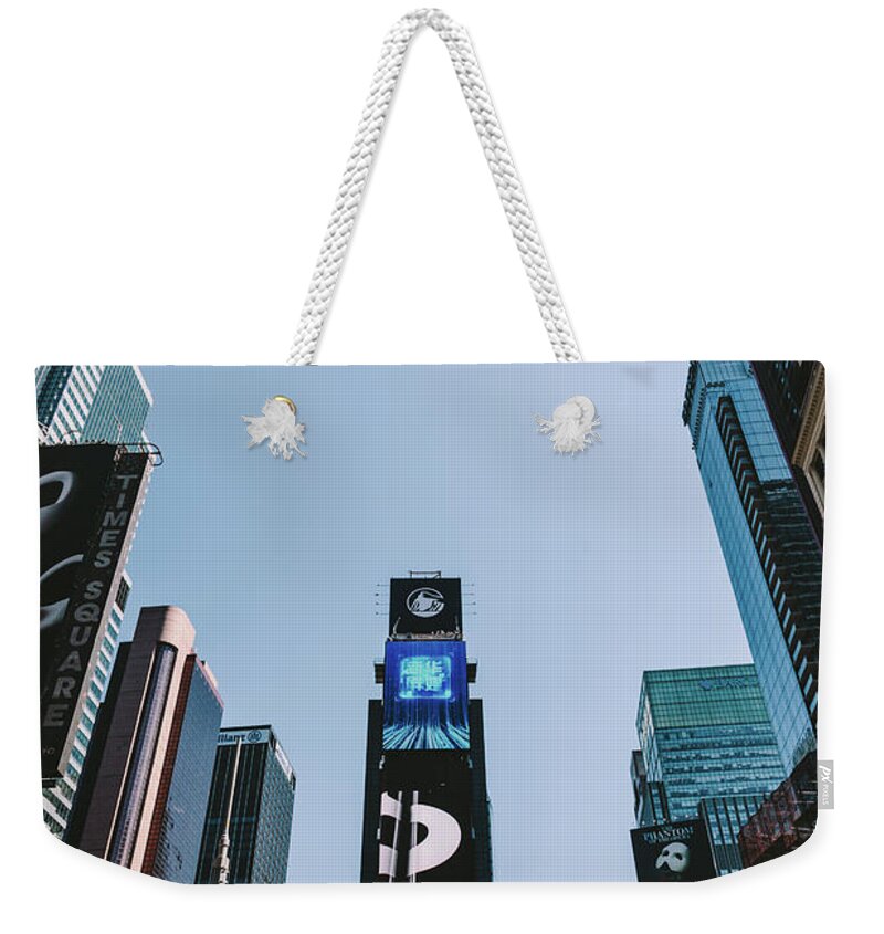 Times Weekender Tote Bag featuring the photograph Times Square in New York City, the USA. by Michal Bednarek