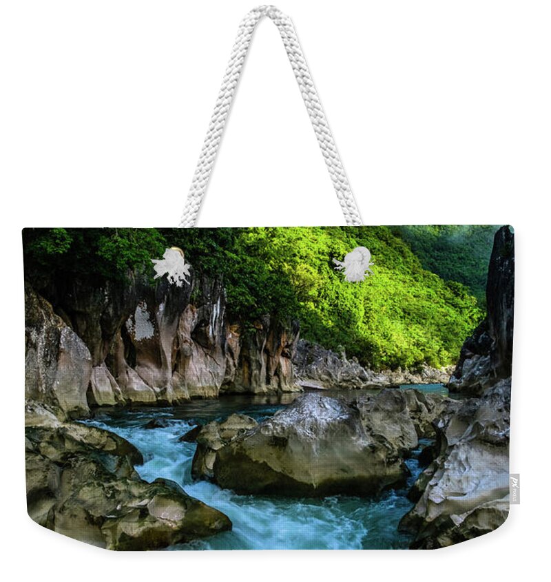 Rizal Weekender Tote Bag featuring the photograph Tinipak River in Tanay by Arj Munoz