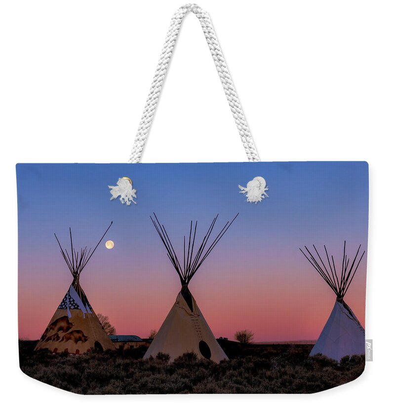 Taos Weekender Tote Bag featuring the photograph Tipis with Morning Full Worm Moon by Elijah Rael