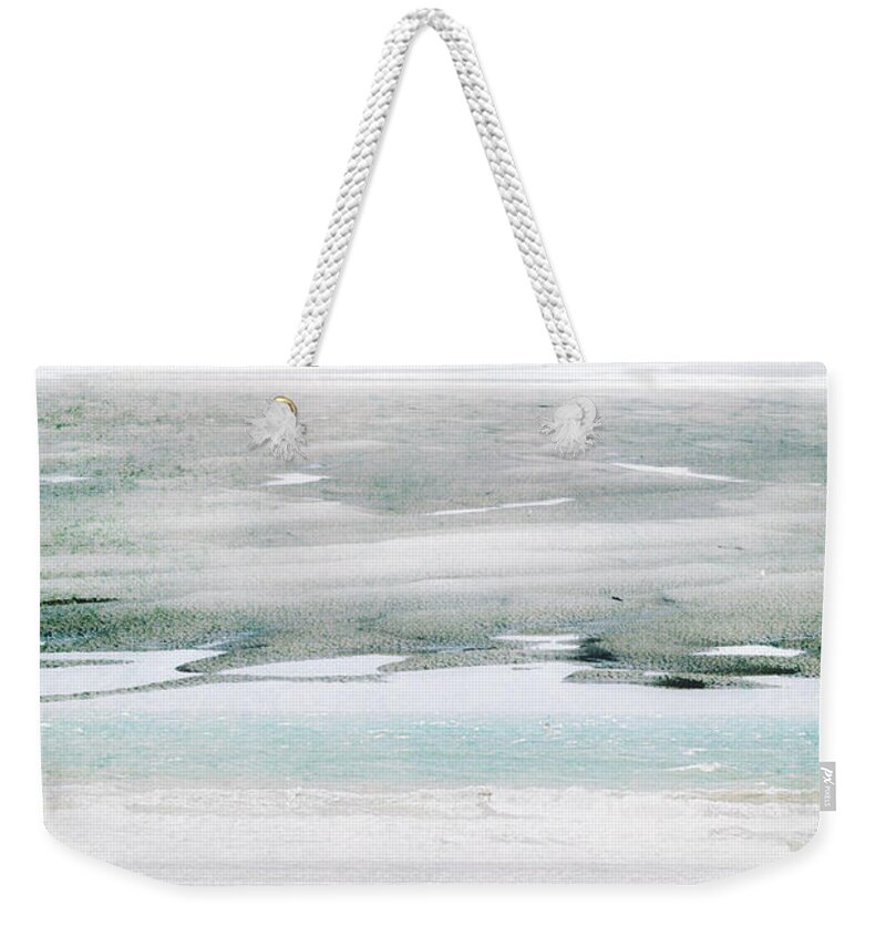 Land Weekender Tote Bag featuring the photograph To the horizon by Yasmina Baggili