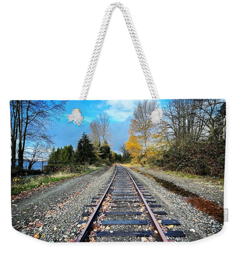 Railroad Tracks Weekender Tote Bag featuring the photograph Tracking Time by Suzanne Lorenz