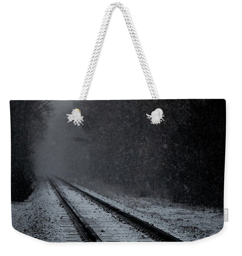 Train Weekender Tote Bag featuring the photograph Tracks in the Snow by Denise Kopko