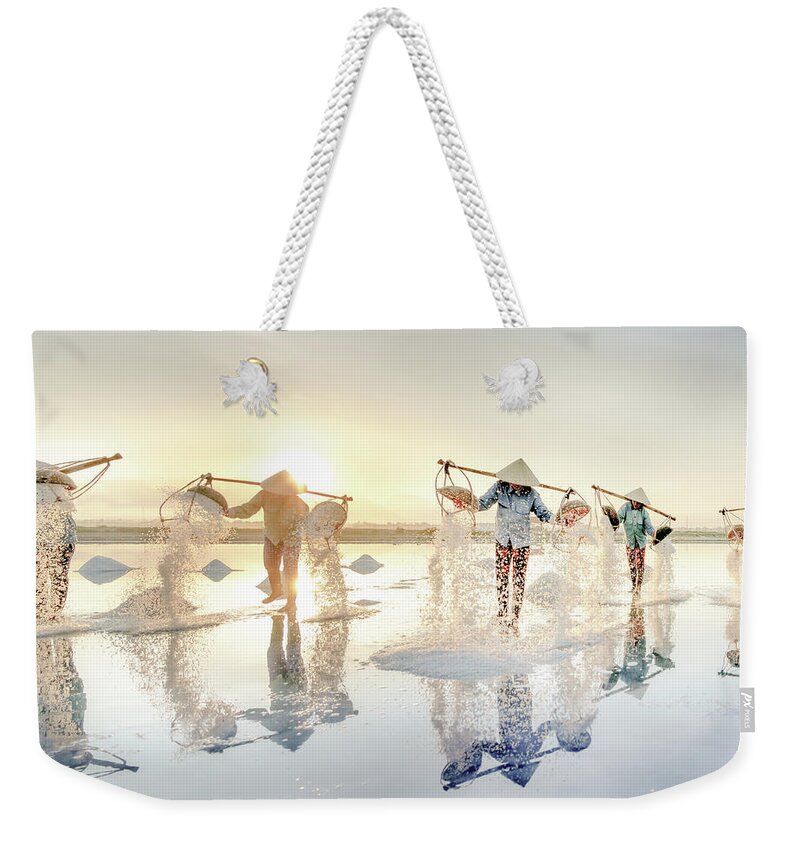 Awesome Weekender Tote Bag featuring the photograph Traditional salt craft by Khanh Bui Phu
