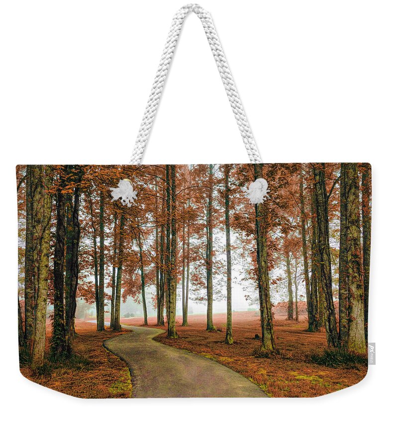 Carolina Weekender Tote Bag featuring the photograph Trail into the Autumn Fog by Debra and Dave Vanderlaan