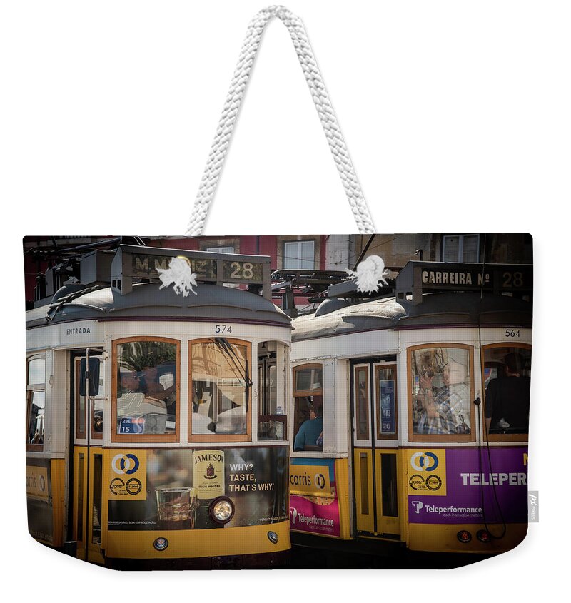 Alfama Weekender Tote Bag featuring the photograph Transportation tram at alfama area Lisbon city in Portugal by Michalakis Ppalis