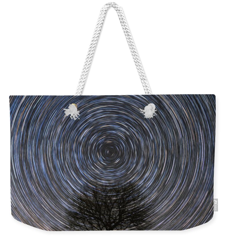 Star Trails Weekender Tote Bag featuring the photograph Tree Topper by Chuck Rasco Photography