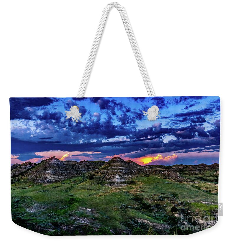 Theodore Weekender Tote Bag featuring the photograph TRNP Back Country Setting Sun by Nathan Wasylewski