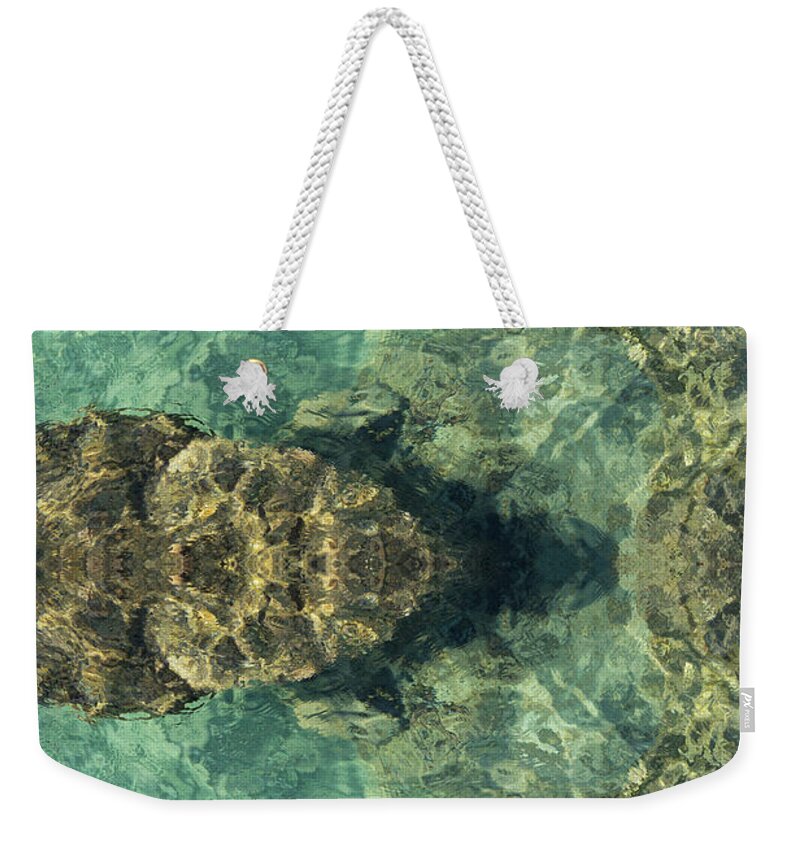 Turquoise Weekender Tote Bag featuring the digital art Turquoise sea water and rocks by Adriana Mueller