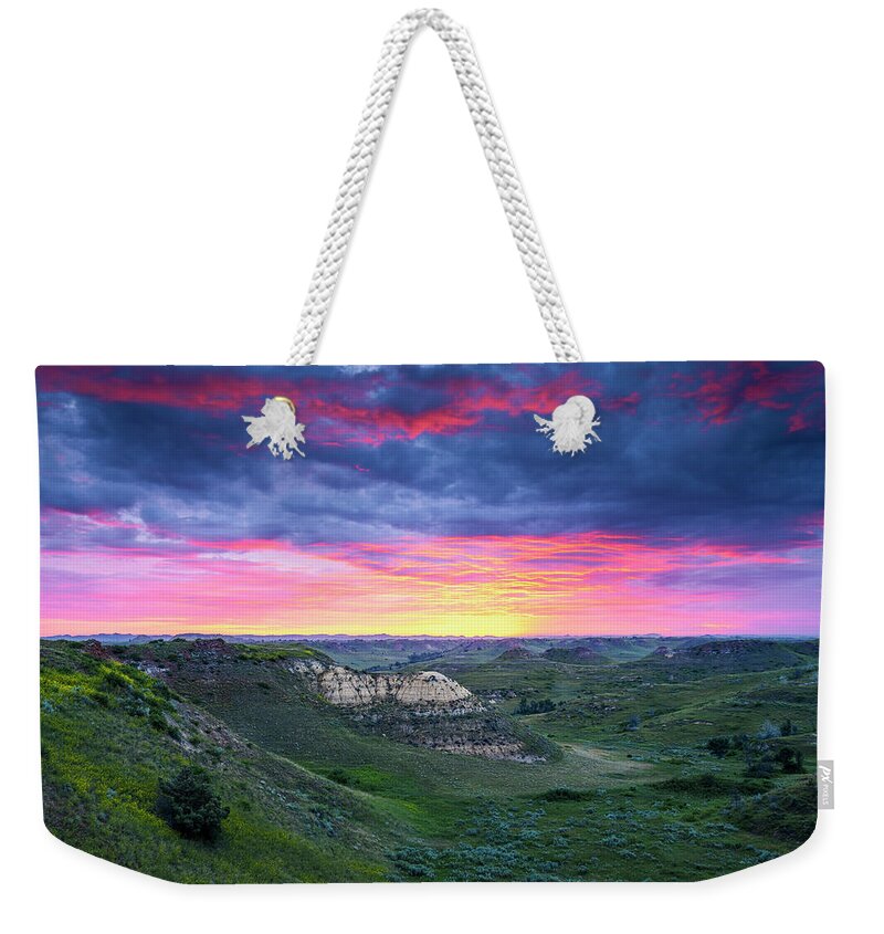 America Weekender Tote Bag featuring the photograph Twilight Over the Badlands by Andy Crawford