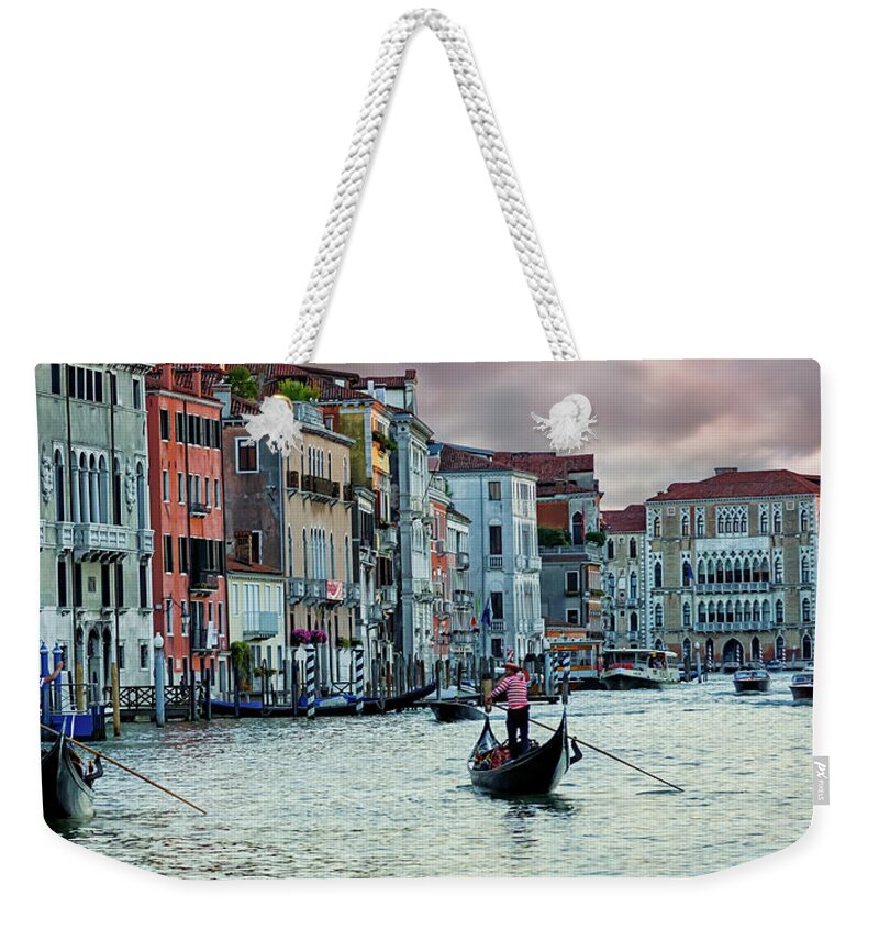 Gary-johnson Weekender Tote Bag featuring the photograph Two Gondoliers In Venice by Gary Johnson
