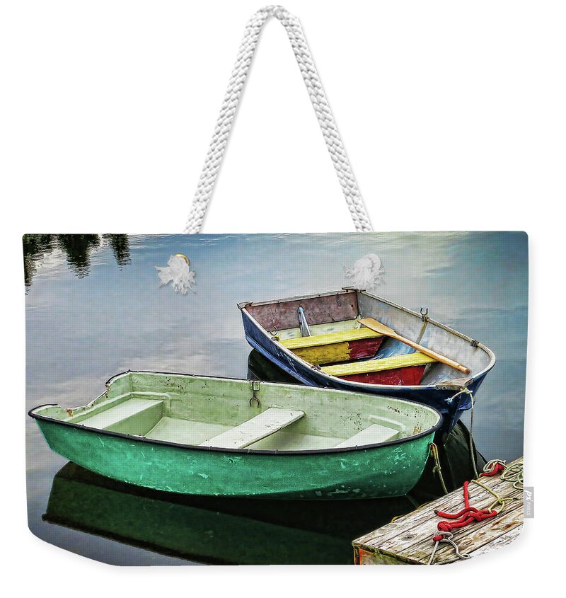Two Weekender Tote Bag featuring the photograph Two rowboats in Nova Scotia by Tatiana Travelways